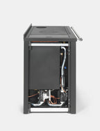 Termostufa a legna Klover Altea con forno, vista laterale, con pannello di controllo e design elegante in acciaio nero.
