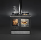 Stufa a legna Klover Star 90 Plus con porta in vetro e design moderno, ideale per riscaldare ambienti domestici.