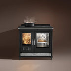 Stufa a legna Klover Star 90 Classic con porta in vetro e design elegante, ideale per riscaldare ambienti domestici.