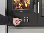 Stufa a legna Klover Star 90 Inox con porta in vetro e finiture in acciaio inossidabile, visibile immagine.