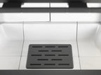 Caminetto a legna Klover Orion 800 con porta in vetro e sistema di raccolta cenere, ideale per riscaldare ambienti domestici.