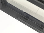 Caminetto a legna Orion Corner L di Klover, angolare in stile moderno con porta in vetro e struttura in acciaio nero.
