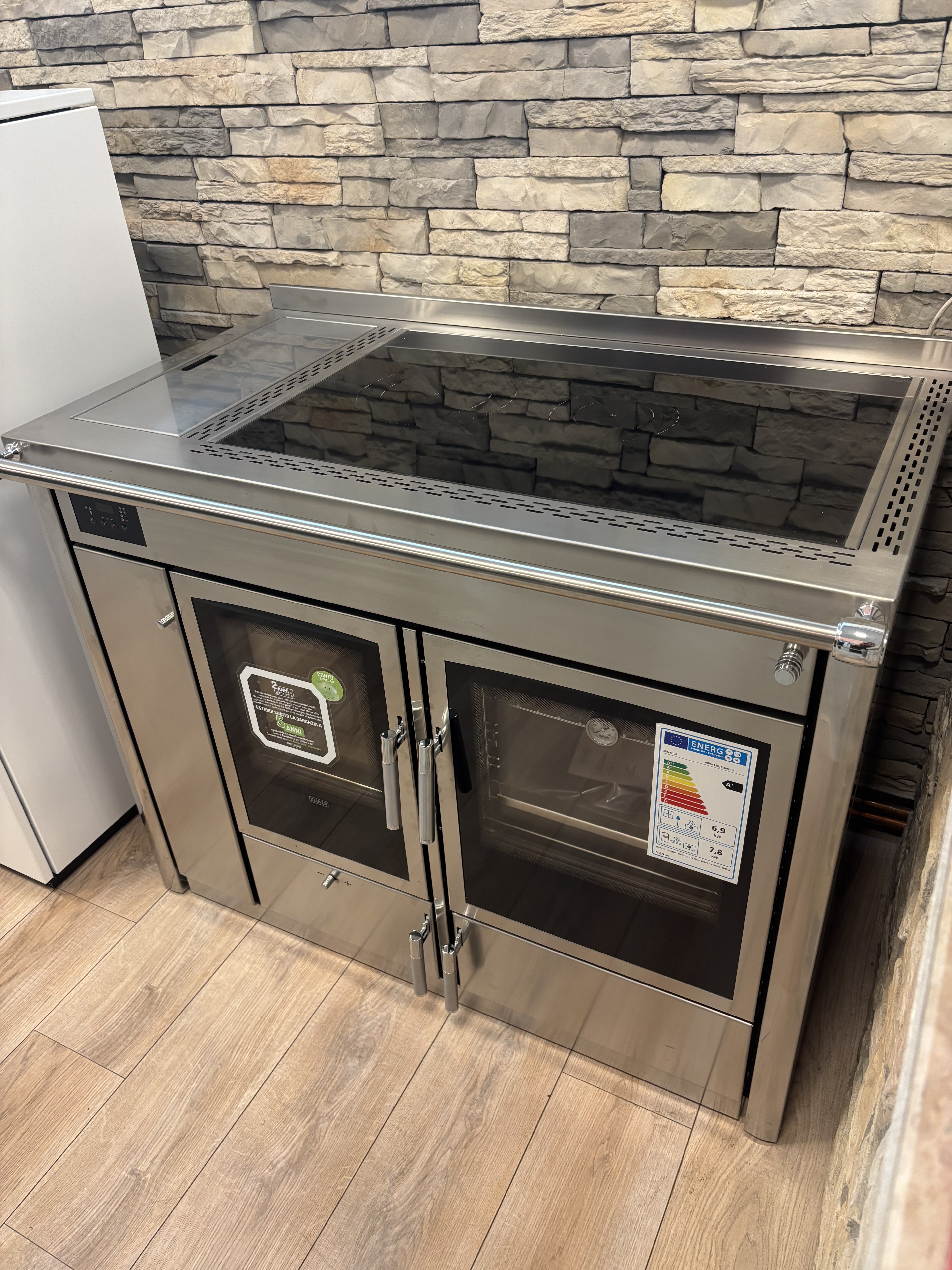 Termostufa a legna Klover Altea Storica Inox con vetro, design elegante e resistente in acciaio inox.