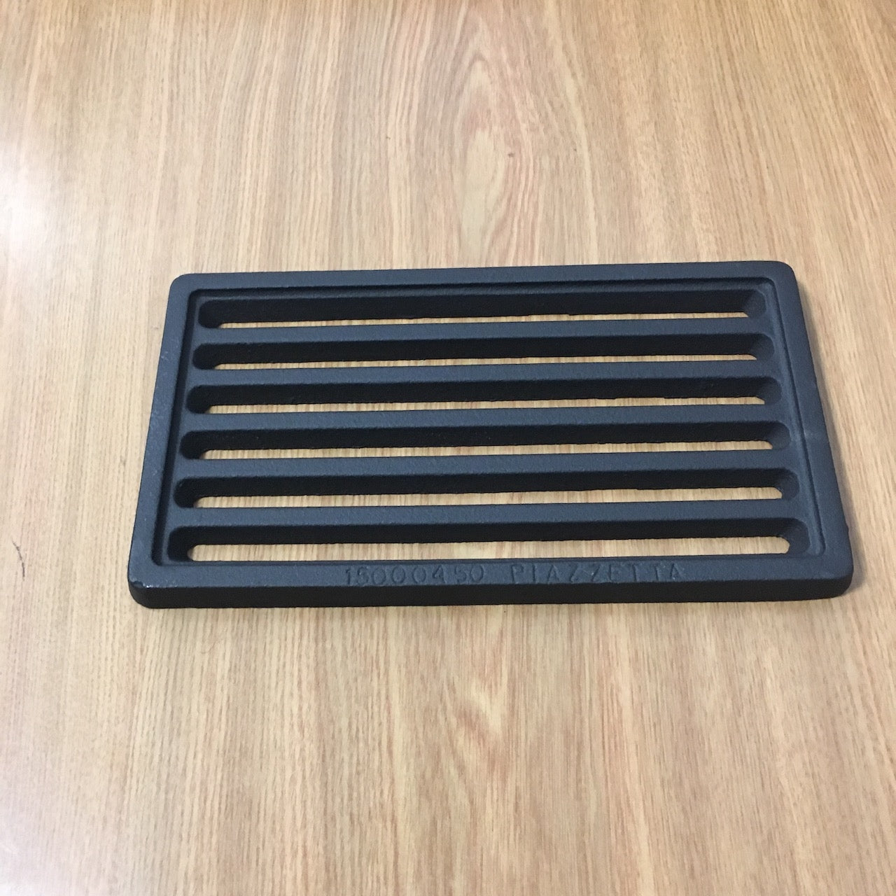 Griglia per caminetti Piazzetta HT, accessori e ricambi in acciaio, con design resistente e funzionale per camini.