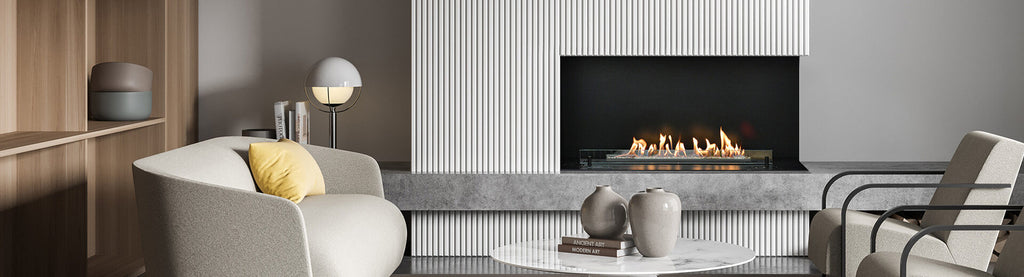 Caminetto a bioetanolo Planika Neo Fireplace con fiamma visibile e design moderno, frontale in acciaio nero.