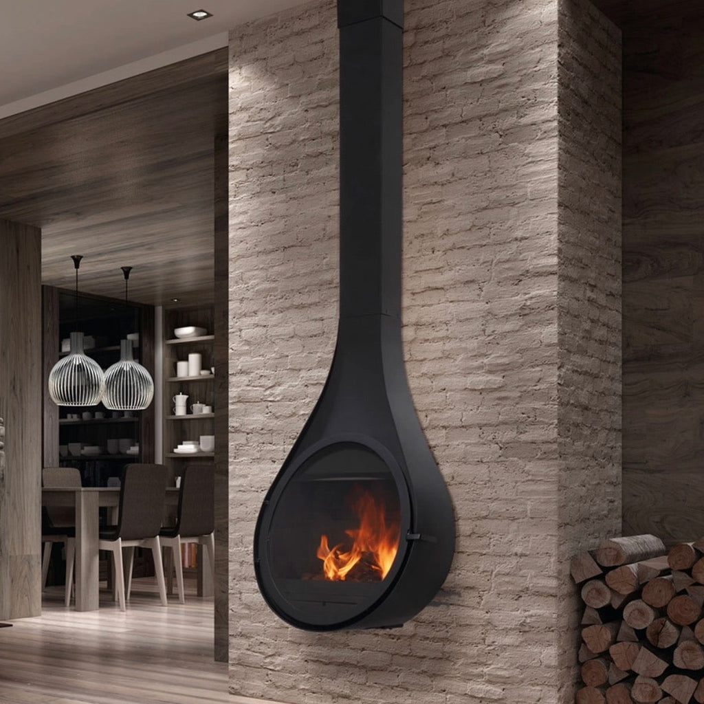 Camino a legna Rocal Drop con design moderno, in mattoni e vetro frontale, ideale per riscaldare e decorare gli ambienti domestici