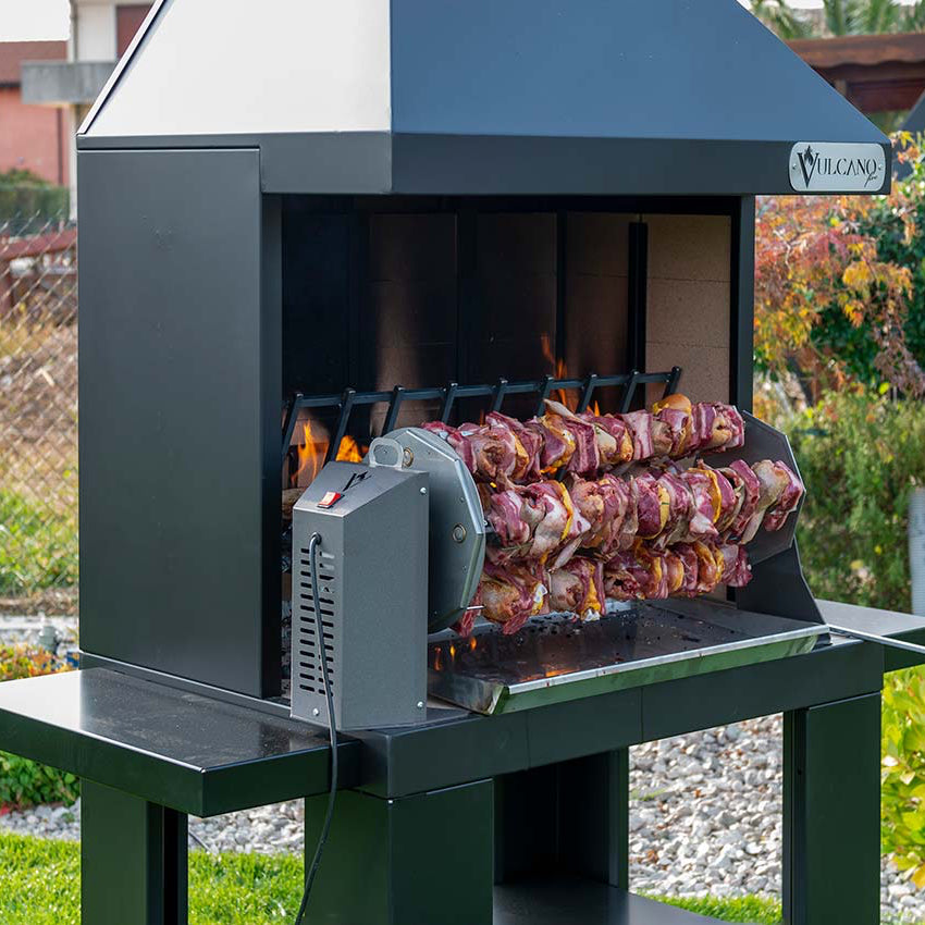 Girarrosto grande Vulcano Fire, accessorio per BBQ con struttura robusta e spiedo per cucinare carne alla griglia.