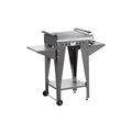 Barbecue a gas Piccolo di Vulcano Fire con piastra liscia, compatto e ideale per cucinare all'aperto.